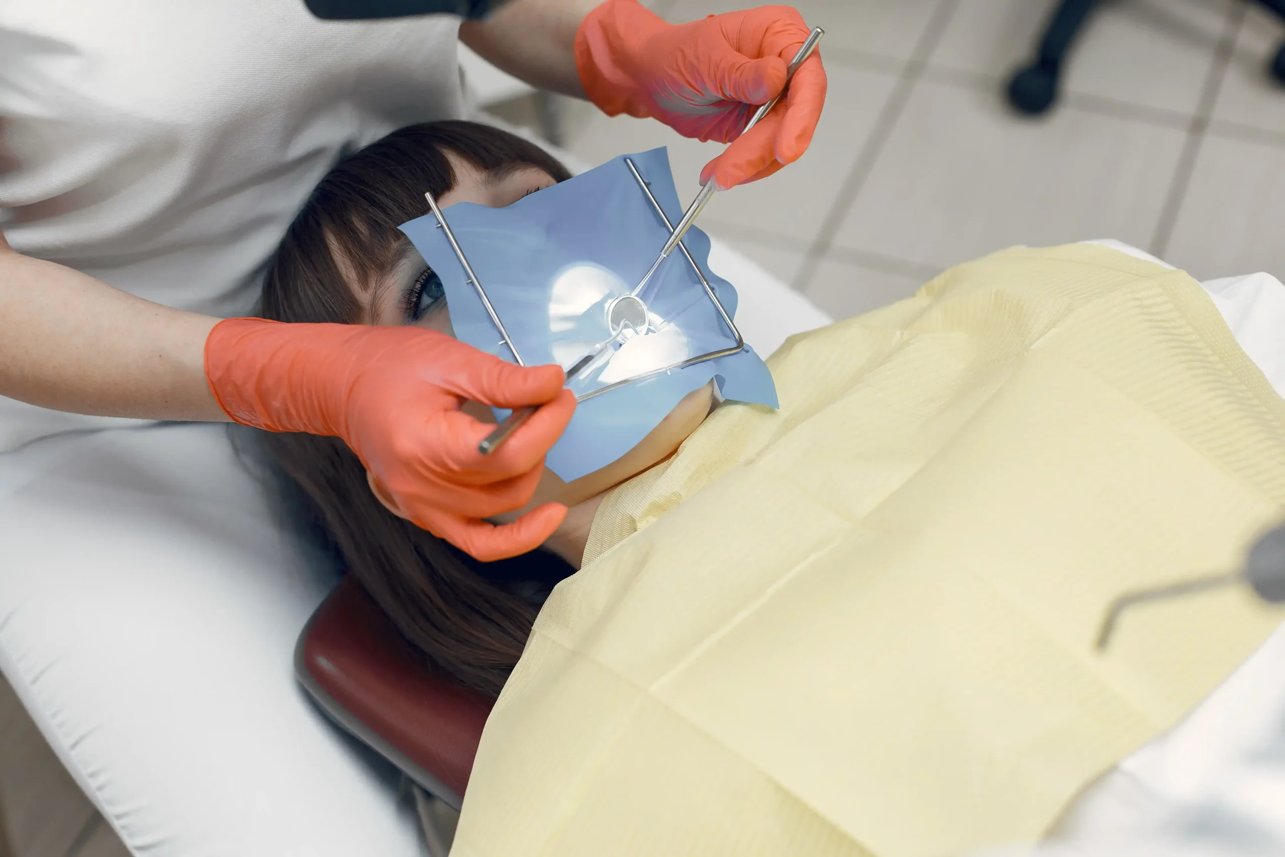 woman-dental-chair-girl-puts-filling-tooth-beauty-treats-her-teeth